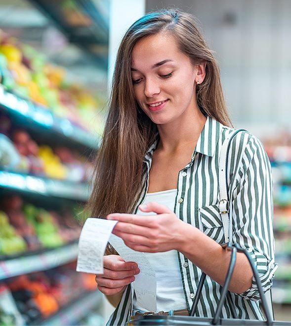 a woman doing grocery shopping