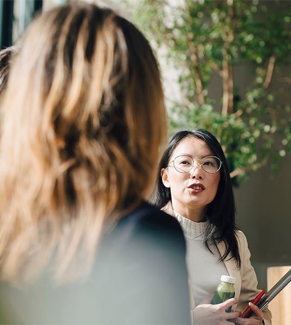 Colleagues meeting at conference event