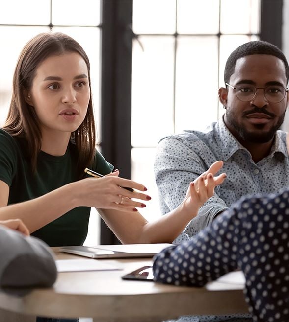 Business professionals engaged in discussions