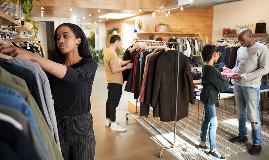 Customers shopping for products in a store.
