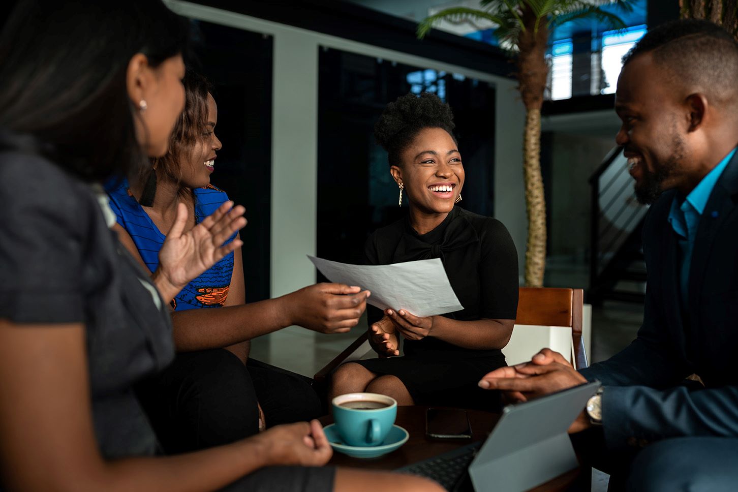 laughing-group-of-colleagues-working-together