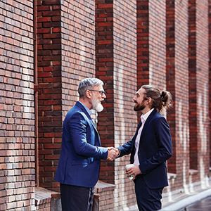 people shaking hands 