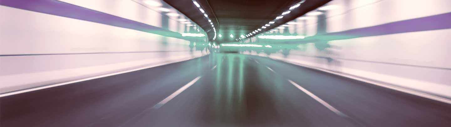 image depicting a car moving through tunnel