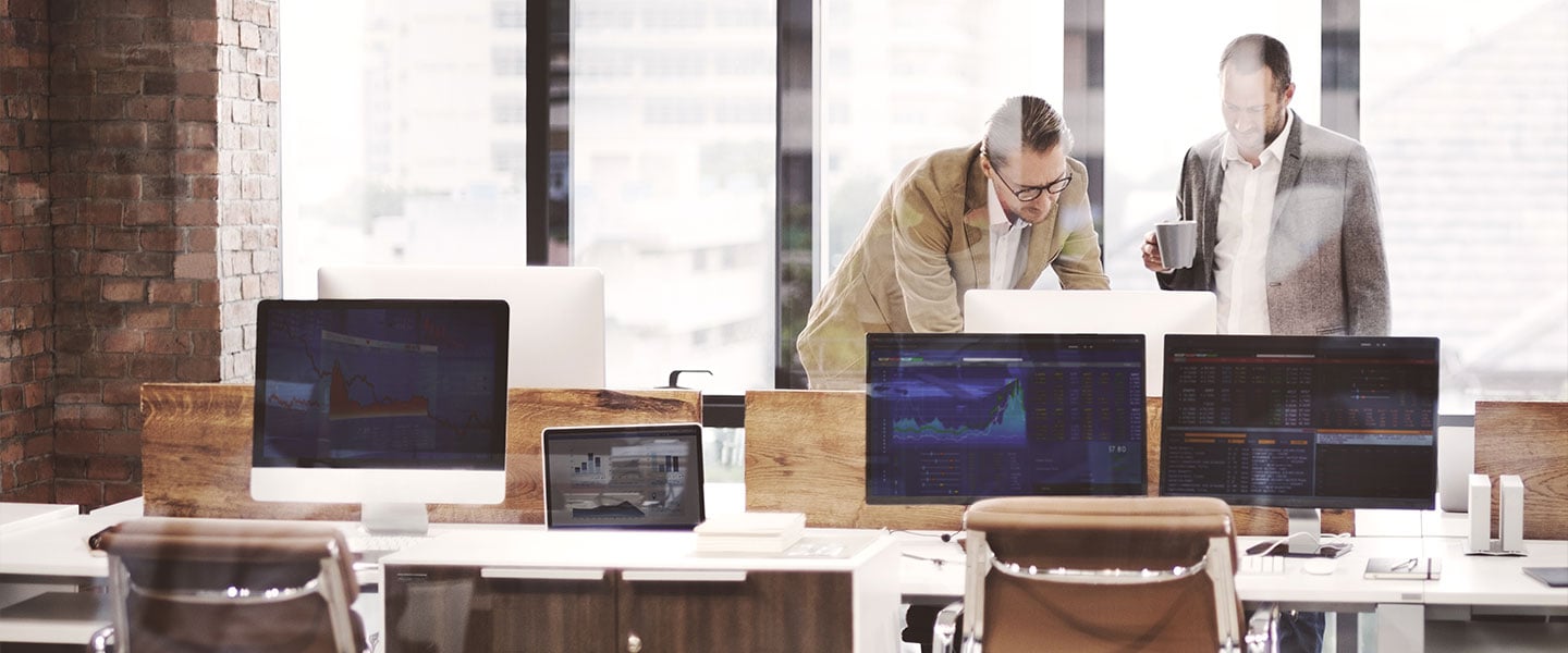 image depicting employees working in the office 