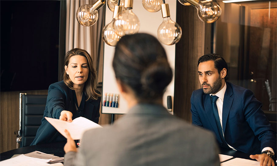 image showing a female lawyer with her colleagues