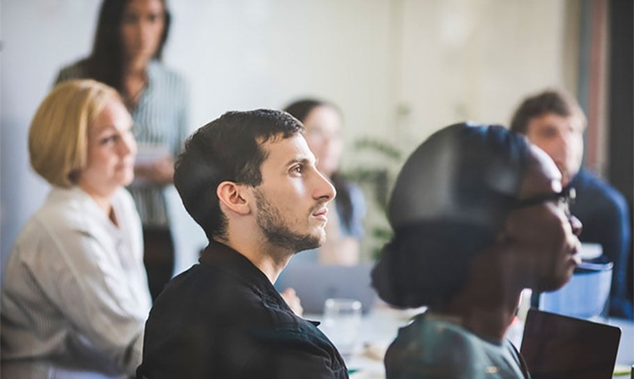 photograph of a team meeting