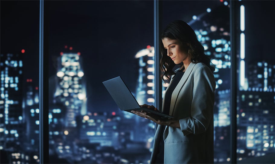 Image of a woman standing near a window